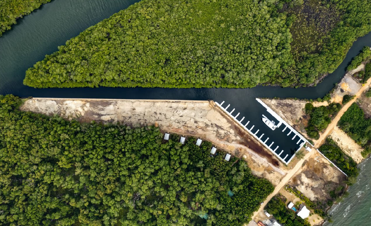 Aerial view of the marina, private canal, and surrounding mangrove forest