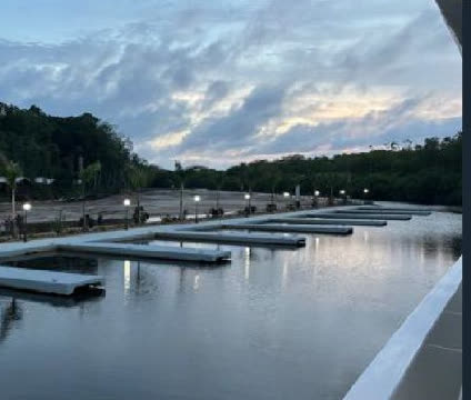 Marina slips on the private canal at dusk